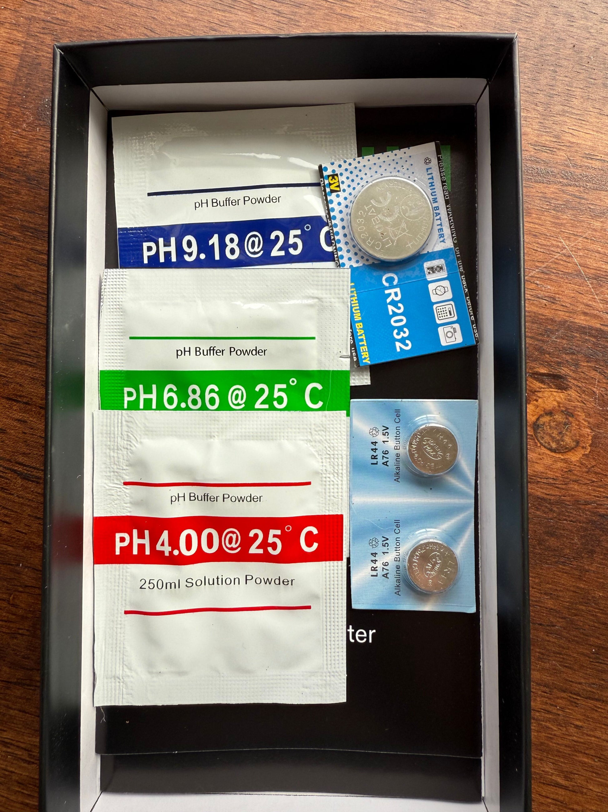 pH buffer powder and extra batteries for pH and TDS meters