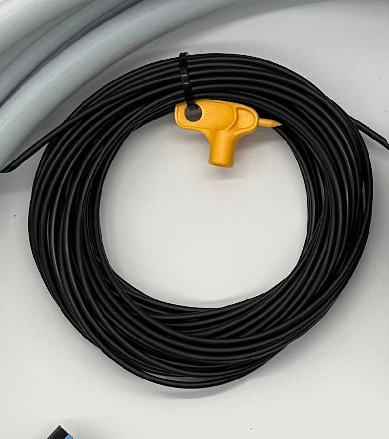 roll of black emitter tubing for vertical towers, included yellow punch tool 